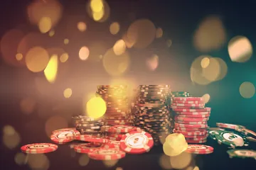 A woman smiling by bright slot machines showing lucky symbols, showcasing the exciting slot offerings at AH99.