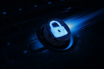 A laptop glowing with a bright login prompt in a minimalistic setup, symbolizing the protected access system at AH99.